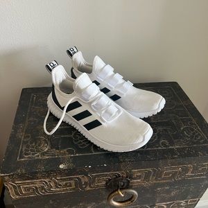 Adidas shoes size 8.5. Hardly worn because too small.